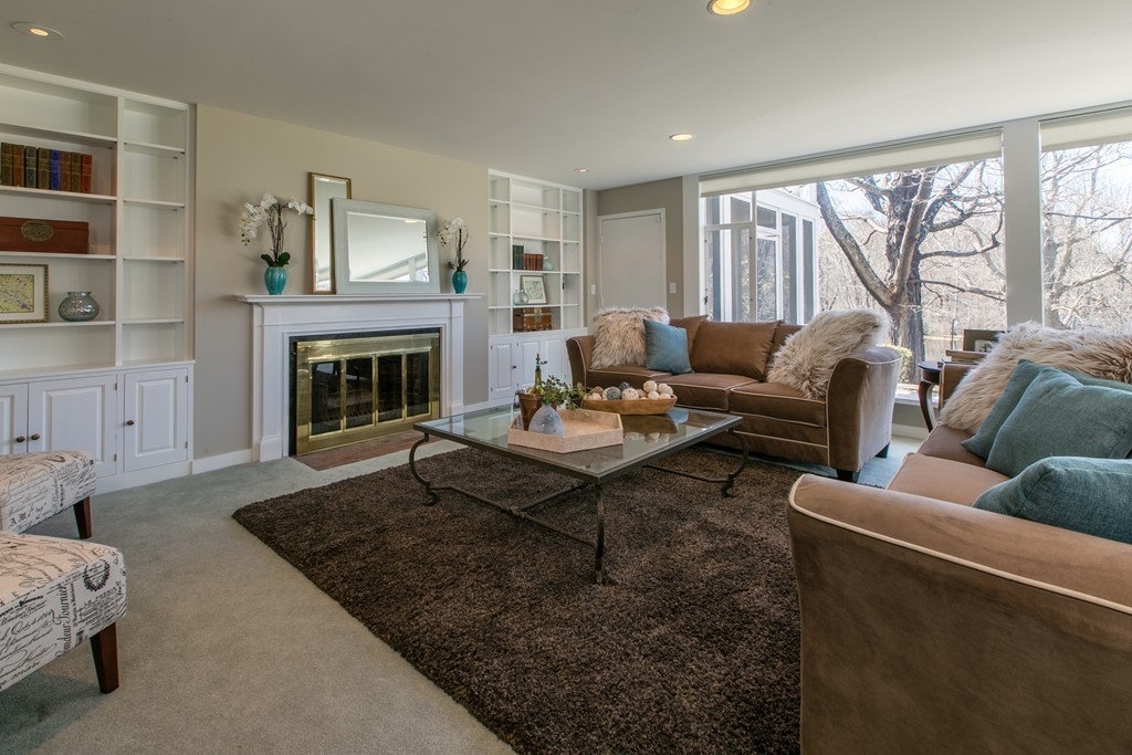 111 Barretts Mill Road Concord, MA 01742 - Photo 6 of 29 a living room with furniture and a fireplace