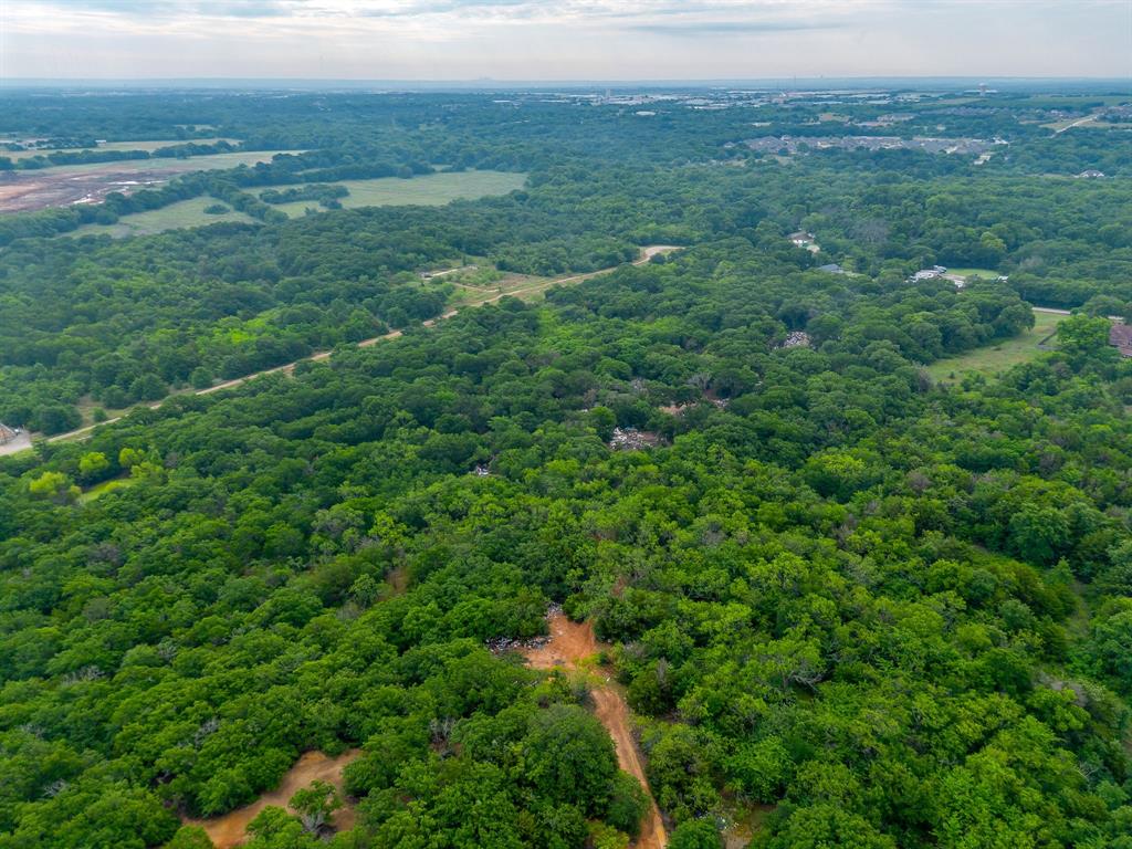 8635 Retta Mansfield Road Mansfield, TX 76063 - Photo 9 of 11 a view of a field with an ocean