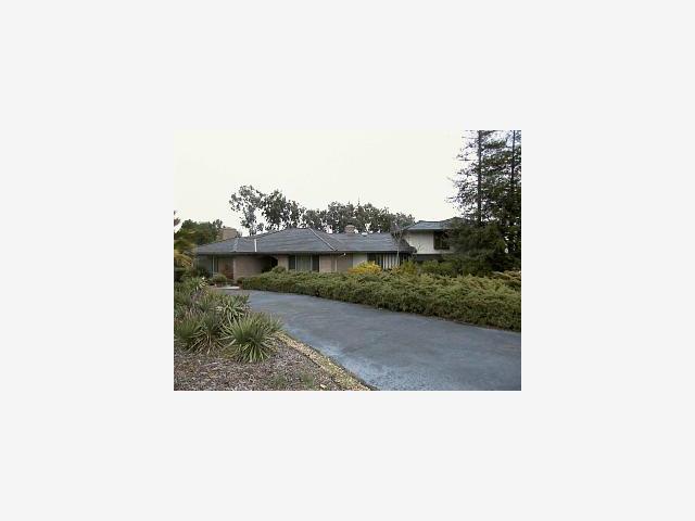 198 Crest Road Woodside, CA 94062 - Photo 1 of 1 a picture of a person on a street