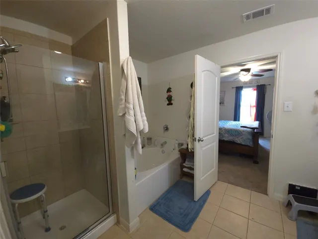 a bathroom with a sink toilet and a mirror