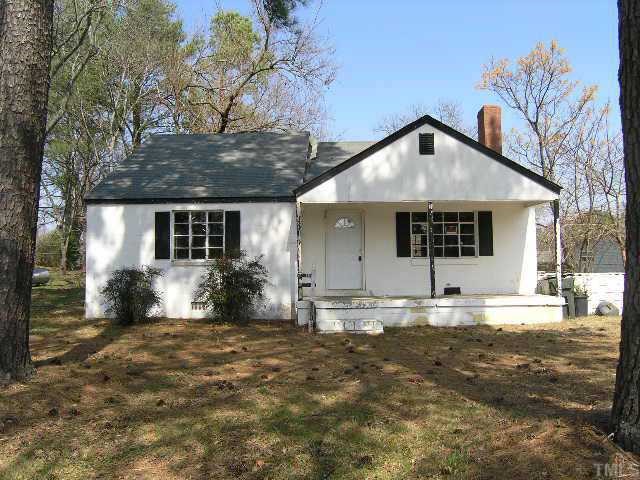 523 Hilltop Drive Raleigh, NC 27610 - Photo 1 of 4 a front view of a house with a yard