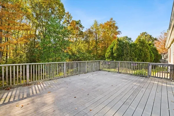 a view of balcony with wooden floor