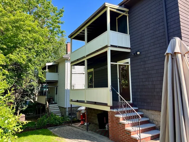 a front view of a house with garage