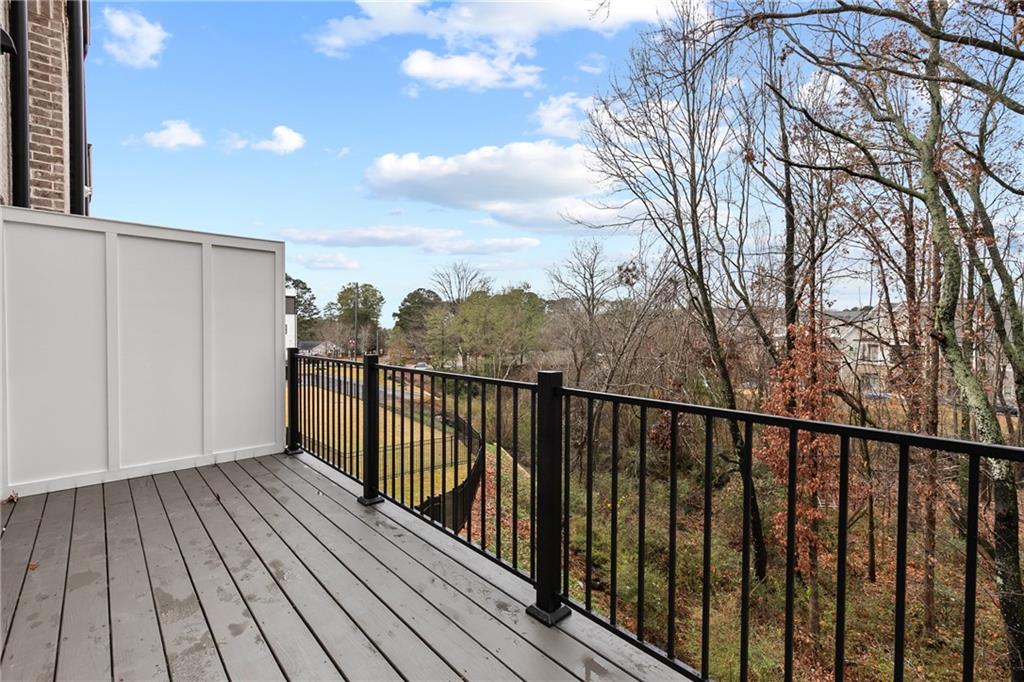 339 Sugarview Road Sugar Hill, GA 30518 - Photo 22 of 53 a view of balcony with wooden floor