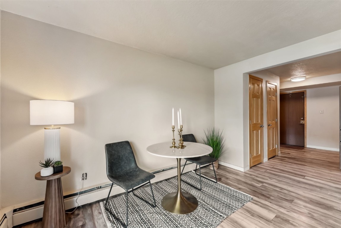 535 Straight Creek Drive, Unit 104 Dillon, CO 80435 - Photo 12 of 30 a view of a livingroom with furniture and wooden floor