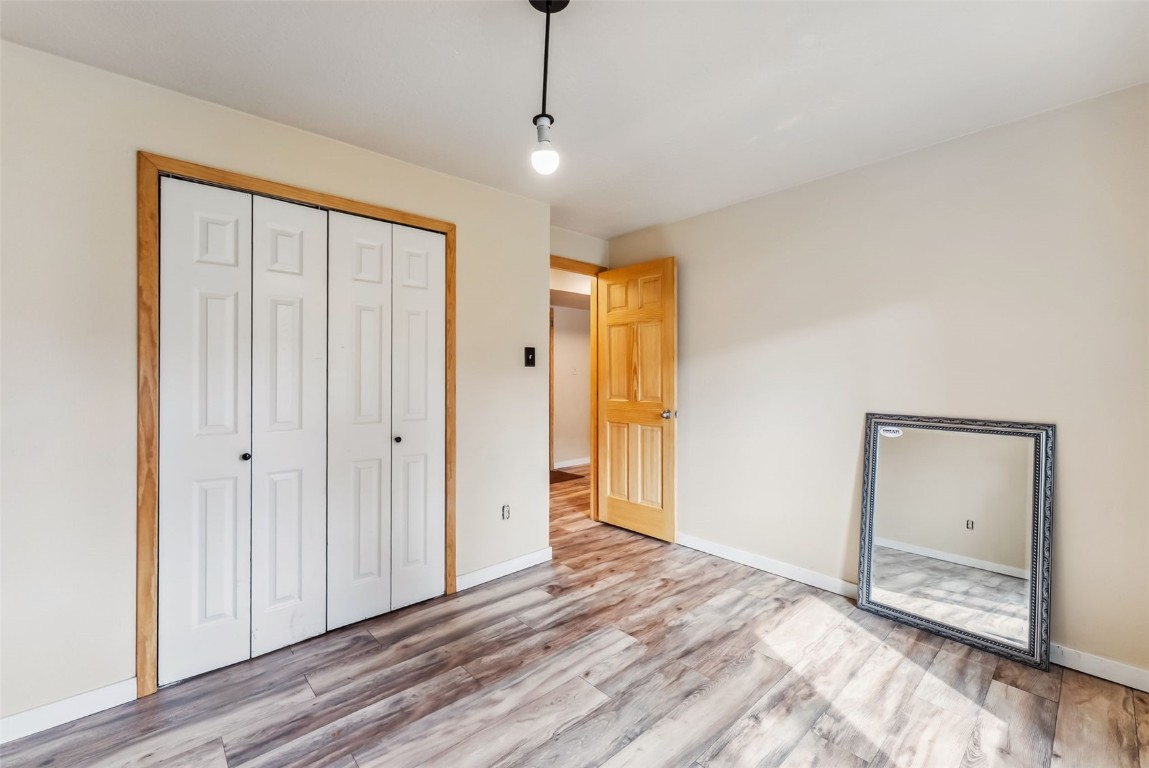 535 Straight Creek Drive, Unit 104 Dillon, CO 80435 - Photo 17 of 30 a view of a livingroom with wooden floor and a window