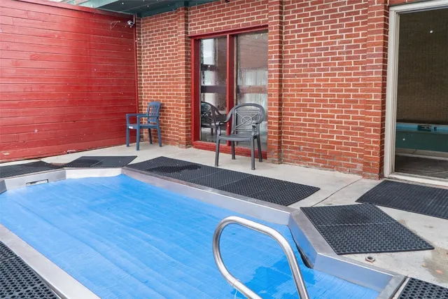 a view of a livingroom with furniture and stairs