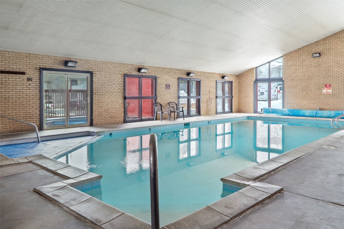 535 Straight Creek Drive, Unit 104 Dillon, CO 80435 - Photo 28 of 30 a living room with furniture