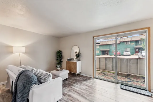 a bedroom with furniture and window