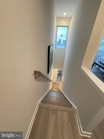 a view of hallway with stairs