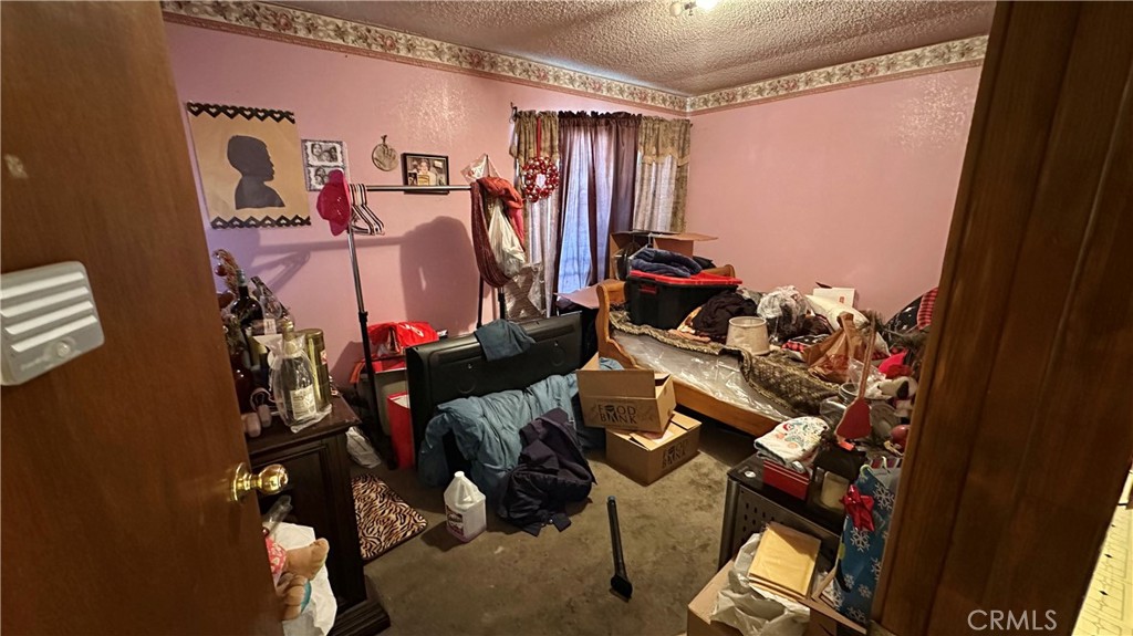 407 South Vancouver Avenue Los Angeles, CA 90022 - Photo 14 of 24 a view of a room with gym equipment