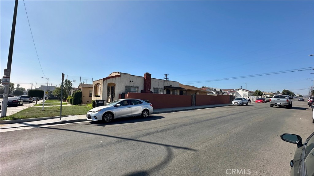 407 South Vancouver Avenue Los Angeles, CA 90022 - Photo 4 of 24 a car parked on the side of the road