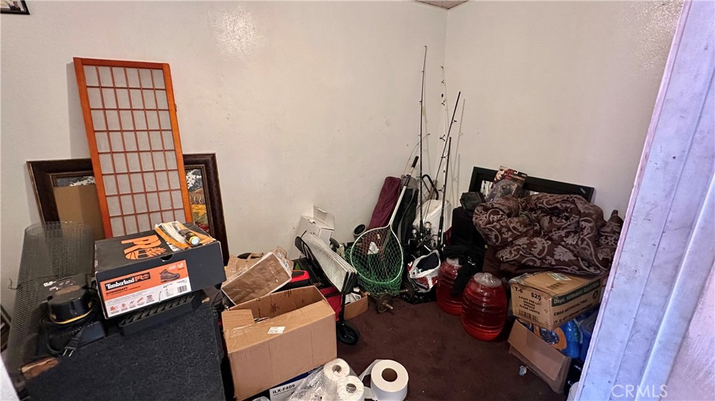 407 South Vancouver Avenue Los Angeles, CA 90022 - Photo 10 of 24 a view of a room with gym equipment