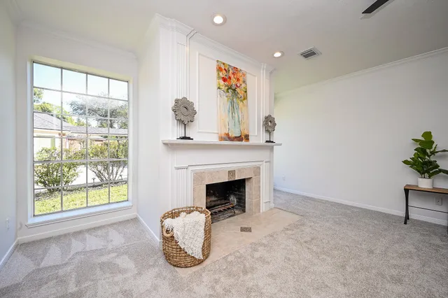 a view of livingroom with furniture and fireplace