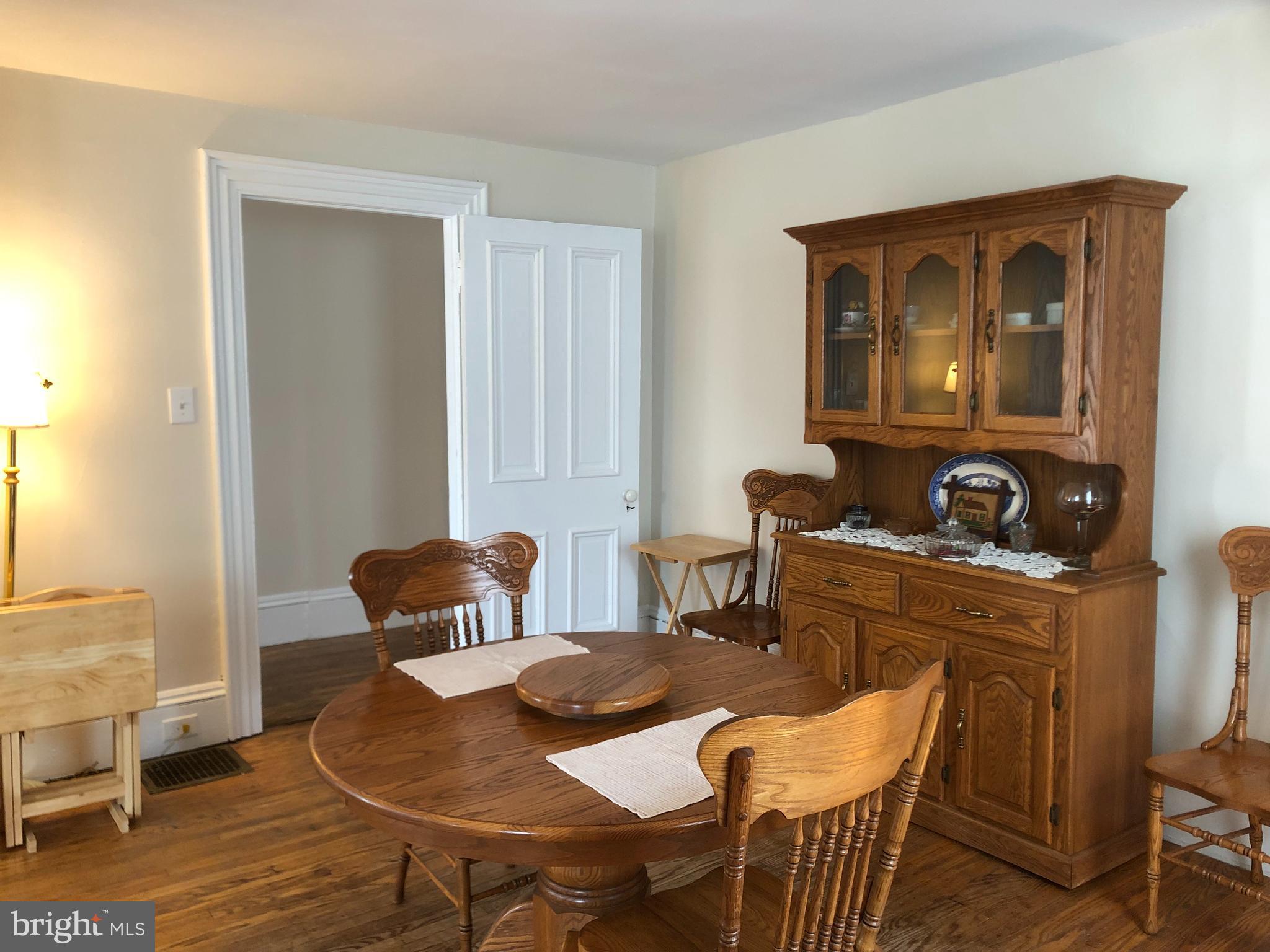 52 Hanover Street Pemberton, NJ 08068 - Photo 8 of 40 a view of a dining room with furniture and wooden floor
