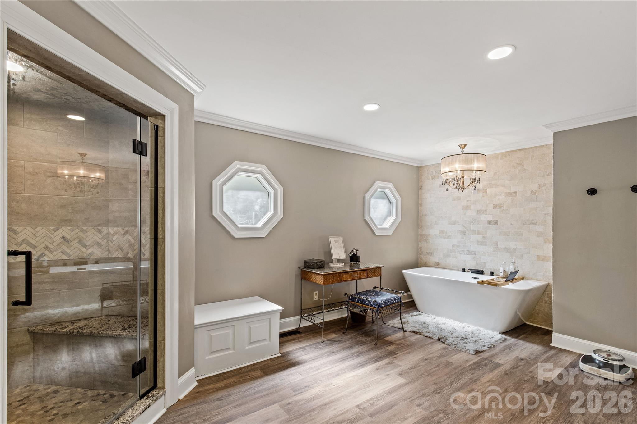 529 Langley Road Lancaster, SC 29720 - Photo 18 of 48 a spacious bathroom with a toilet a sink and a large mirror