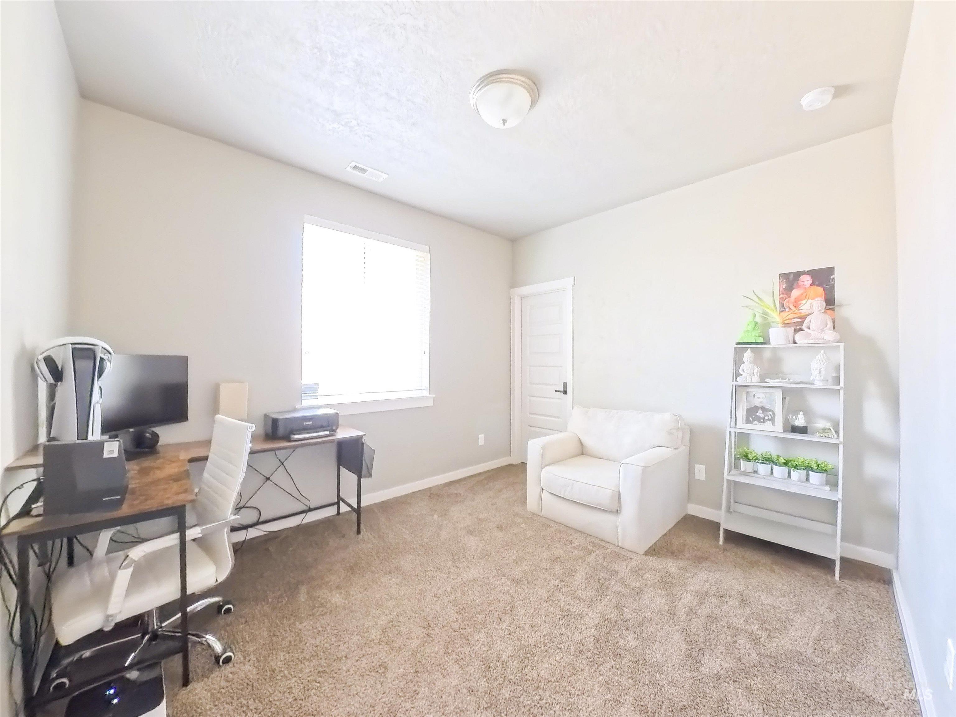347 South Truss Lane Meridian, ID 83642 - Photo 17 of 24 Office area featuring light carpet and baseboards