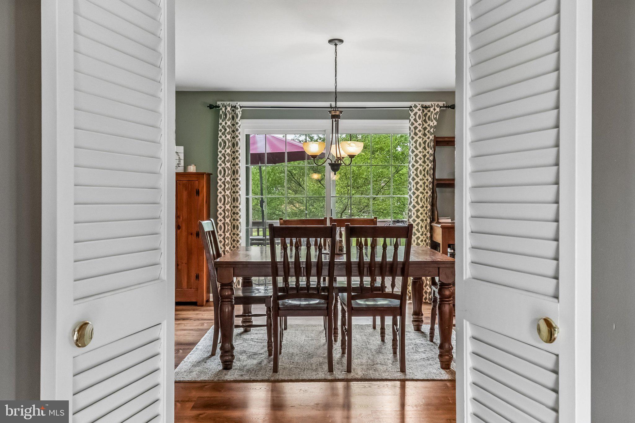 6774 Grays Mill Road Warrenton, VA 20187 - Photo 20 of 35 a view of a dining room with furniture window and outside view