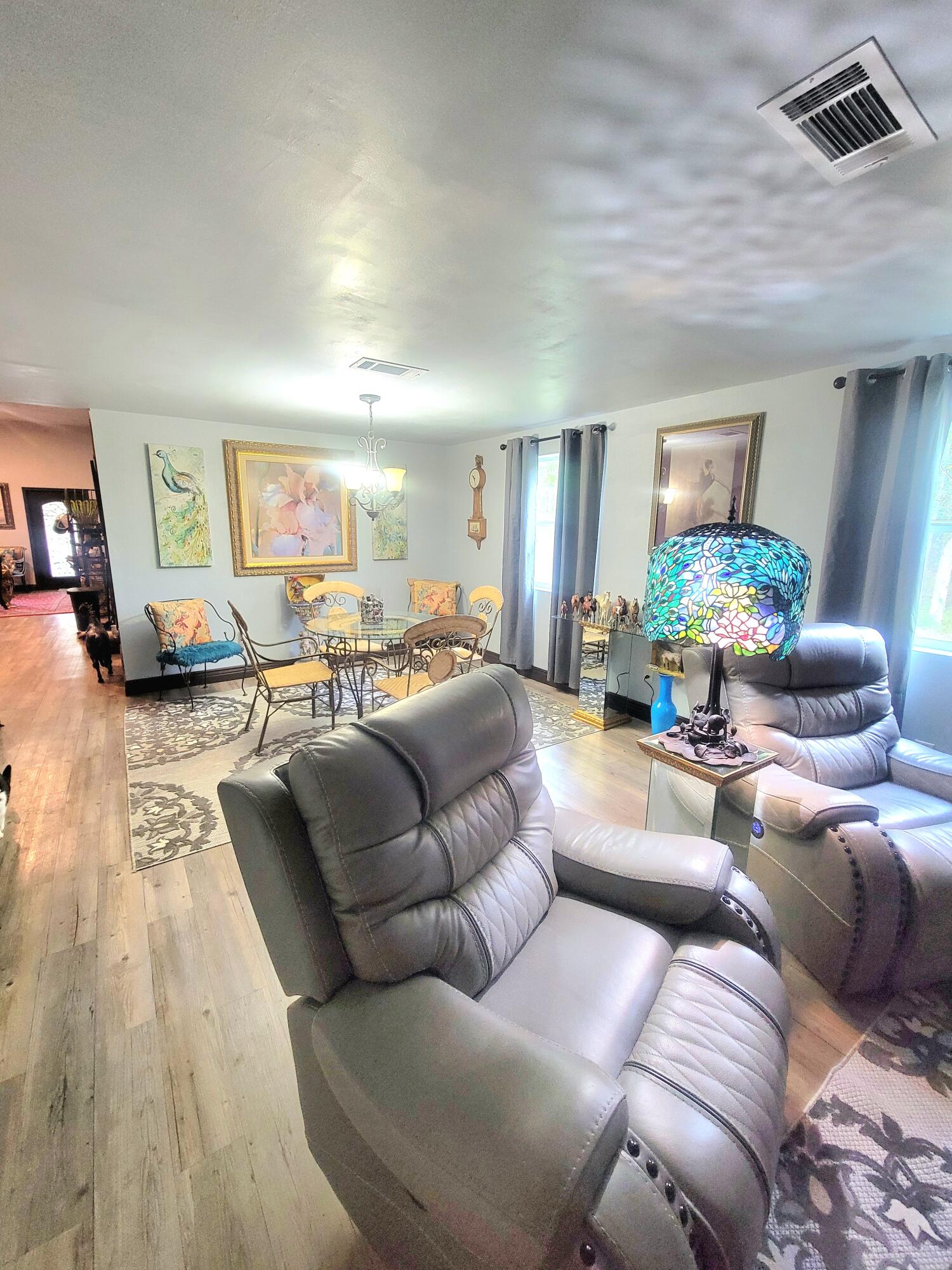 1508 Crooked Creek Road Ponce de Leon, FL 32455 - Photo 18 of 62 a living room with furniture and a wooden floor