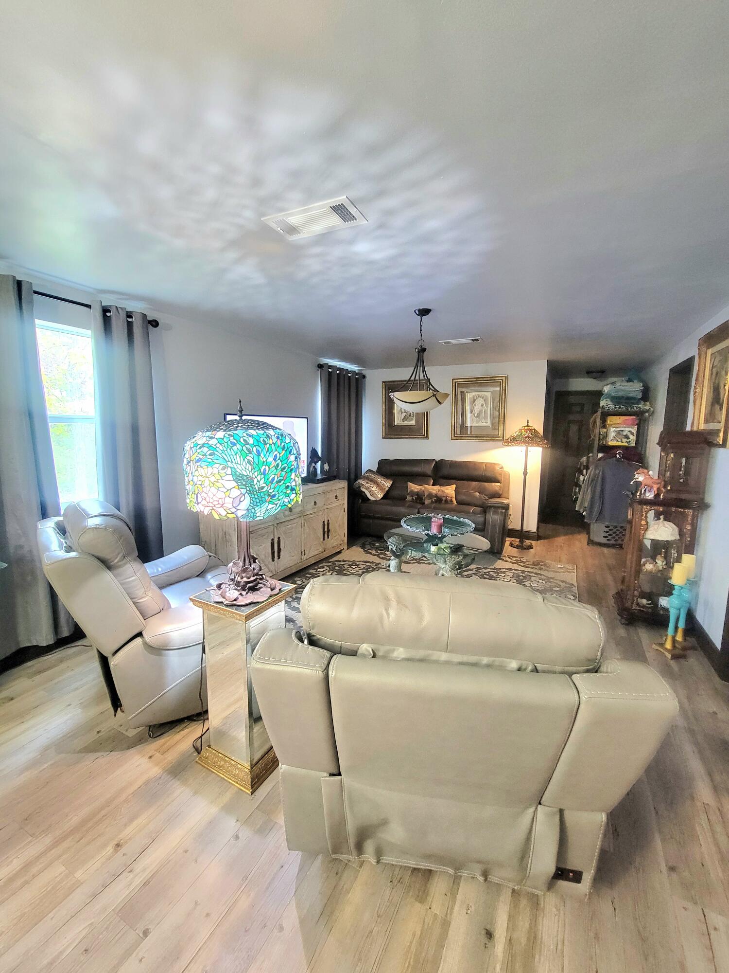 1508 Crooked Creek Road Ponce de Leon, FL 32455 - Photo 19 of 62 a living room with furniture and a couch