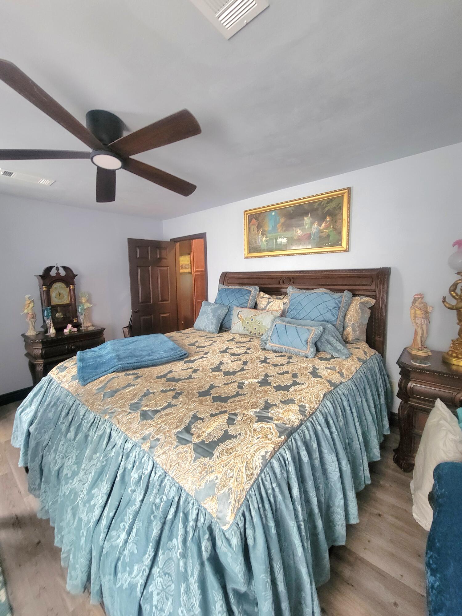 1508 Crooked Creek Road Ponce de Leon, FL 32455 - Photo 20 of 62 a bedroom with a bed and wooden floor