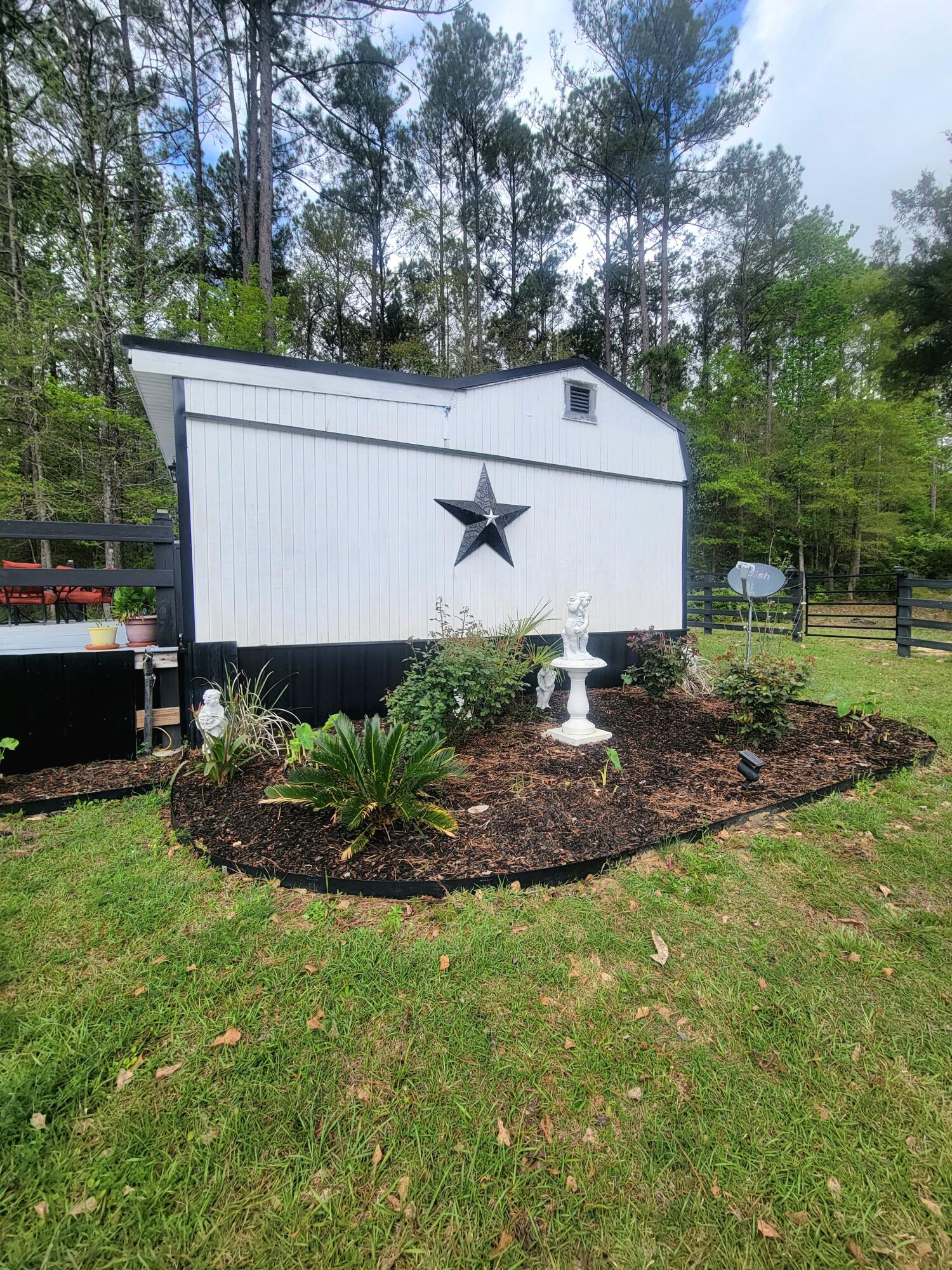 1508 Crooked Creek Road Ponce de Leon, FL 32455 - Photo 36 of 64 side of tiny house