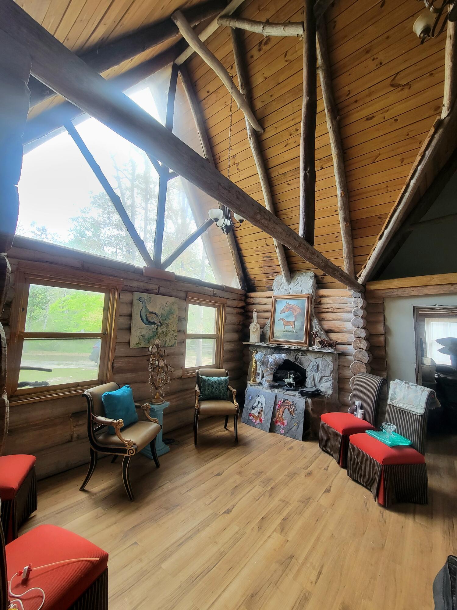 1508 Crooked Creek Road Ponce de Leon, FL 32455 - Photo 39 of 62 a living room with furniture kitchen view and a large window