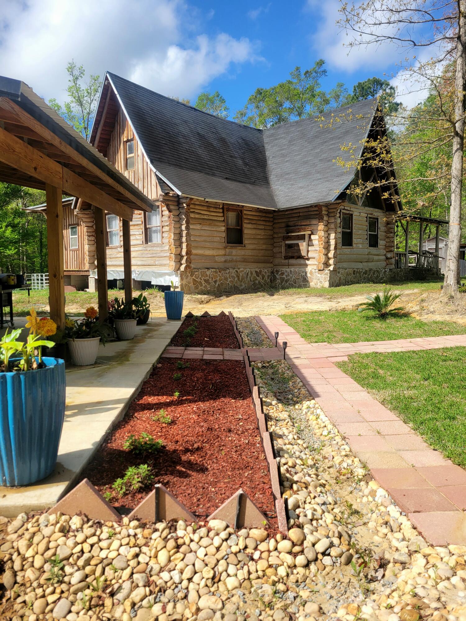 1508 Crooked Creek Road Ponce de Leon, FL 32455 - Photo 8 of 62 a view of a house with entertaining space