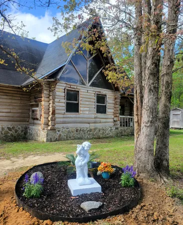 a kitchen with a dining table and chairs