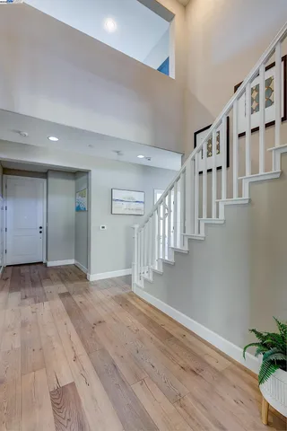 a very nice looking living room with furniture and a large window