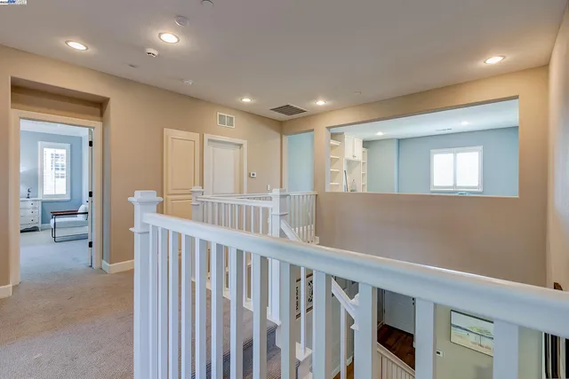 a bed room with a bed and a window