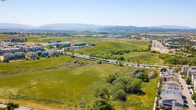 a view of a city with an ocean view