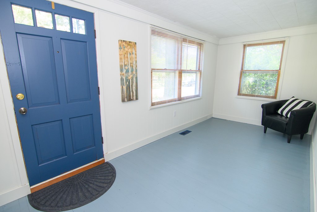 24432 Maxwell Street Parksley, VA 23421 - Photo 15 of 39 a view of a livingroom with furniture and windows