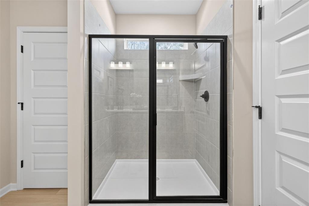 30 North Hvn Drive Rome, GA 30165 - Photo 34 of 38 a bathroom with a glass shower door