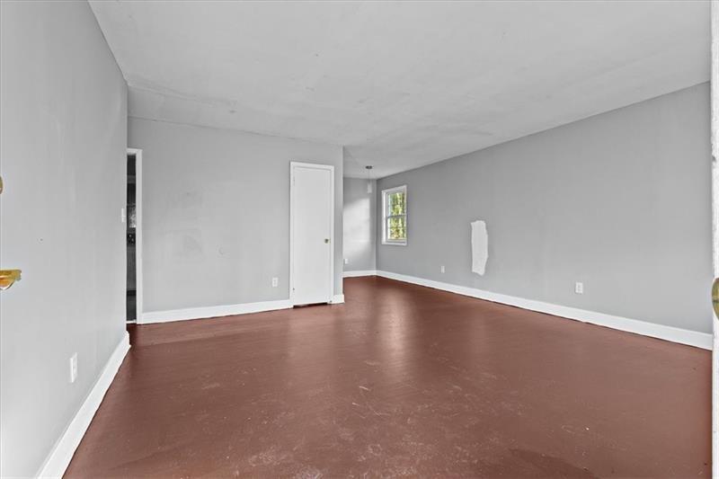 685 Bolton Road Northwest Atlanta, GA 30331 - Photo 3 of 21 a view of an empty room with a window