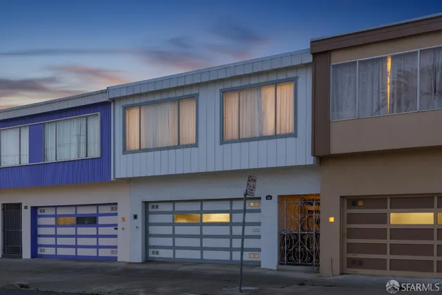 a front view of a house with glass windows