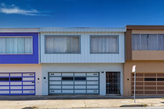 a view of a house with wooden floor and a window
