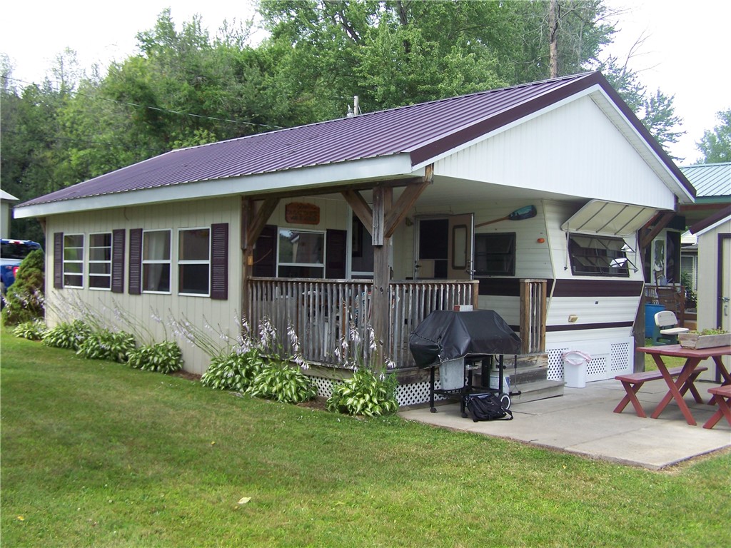 54 Lilly Lane Conquest, NY 13143 - Photo 2 of 21 Your own personal oasis with addition added to a 1