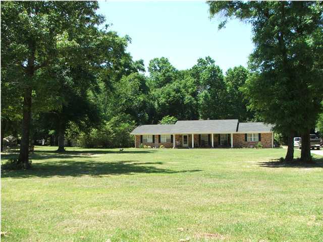 5102 Griffith Mill Road Holt, FL 32564 - Photo 3 of 12 a view of an outdoor space and a yard