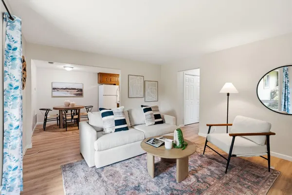 a view of room with hardwood floor and window