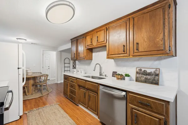 a view of a house with a backyard