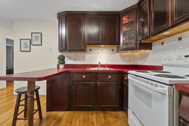 357 Faneuil Street, Unit 12 Boston, MA 02135 - Photo 9 of 15 a utility room with dryer and washer