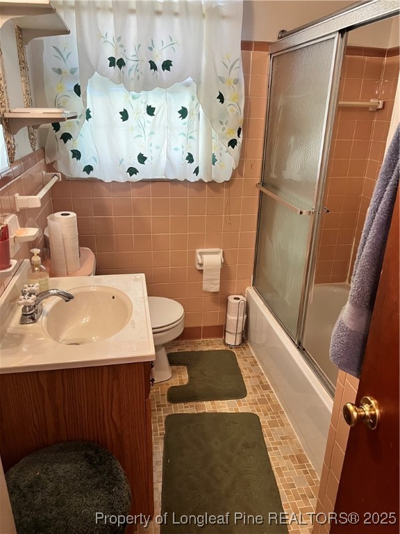122 Bunker Hill Road Fayetteville, NC 28314 - Photo 12 of 16 a bathroom with a sink and mirror with toilet
