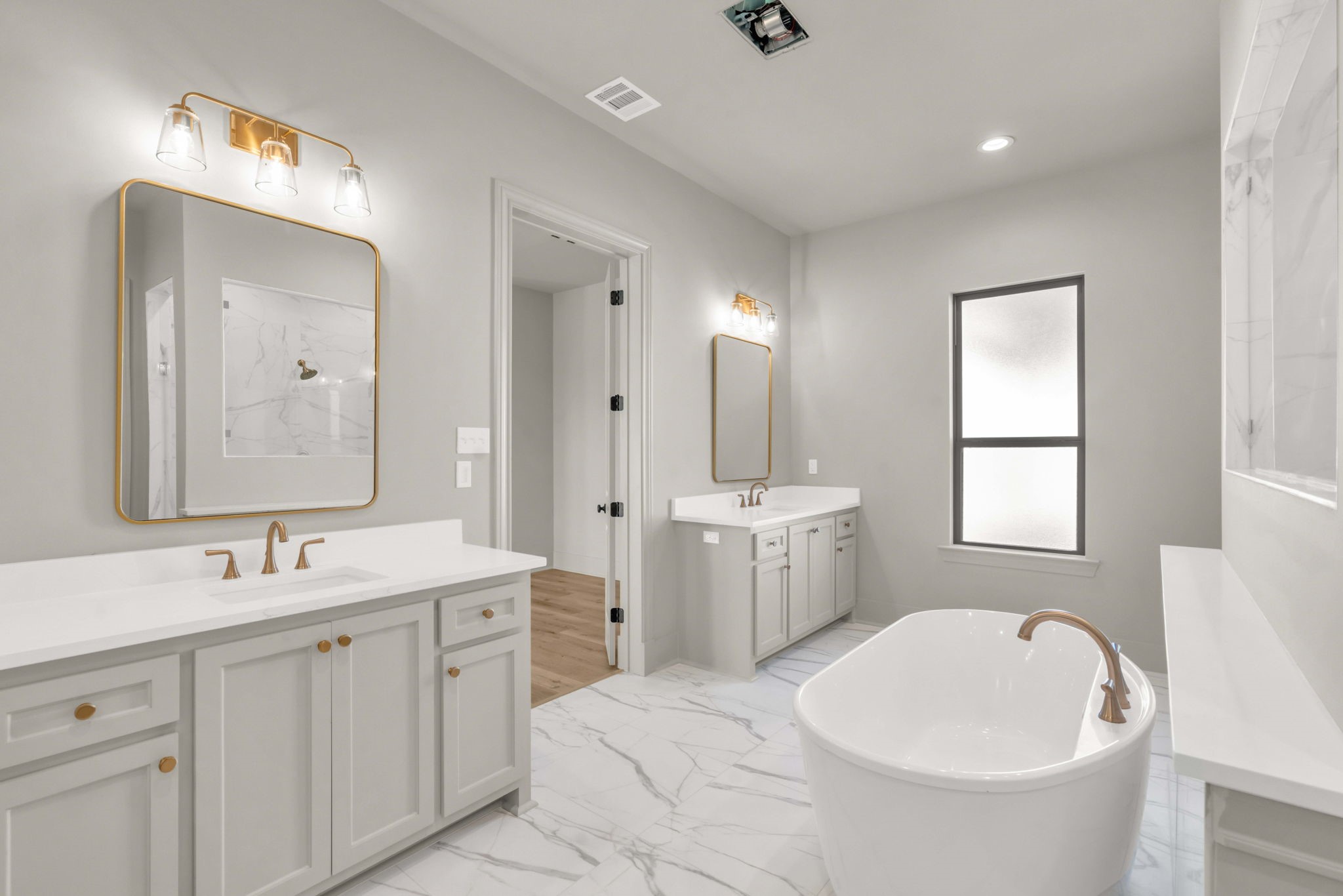 24972 Hopeview Way Montgomery, TX 77356 - Photo 20 of 38 Separate sinks offer a more comfortable area for getting ready in the morning.