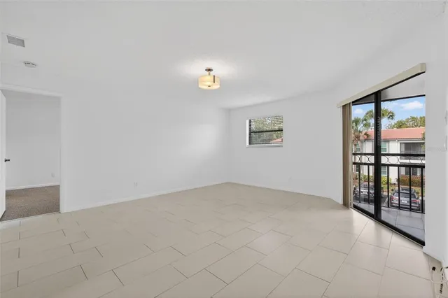 a view of an empty room with window