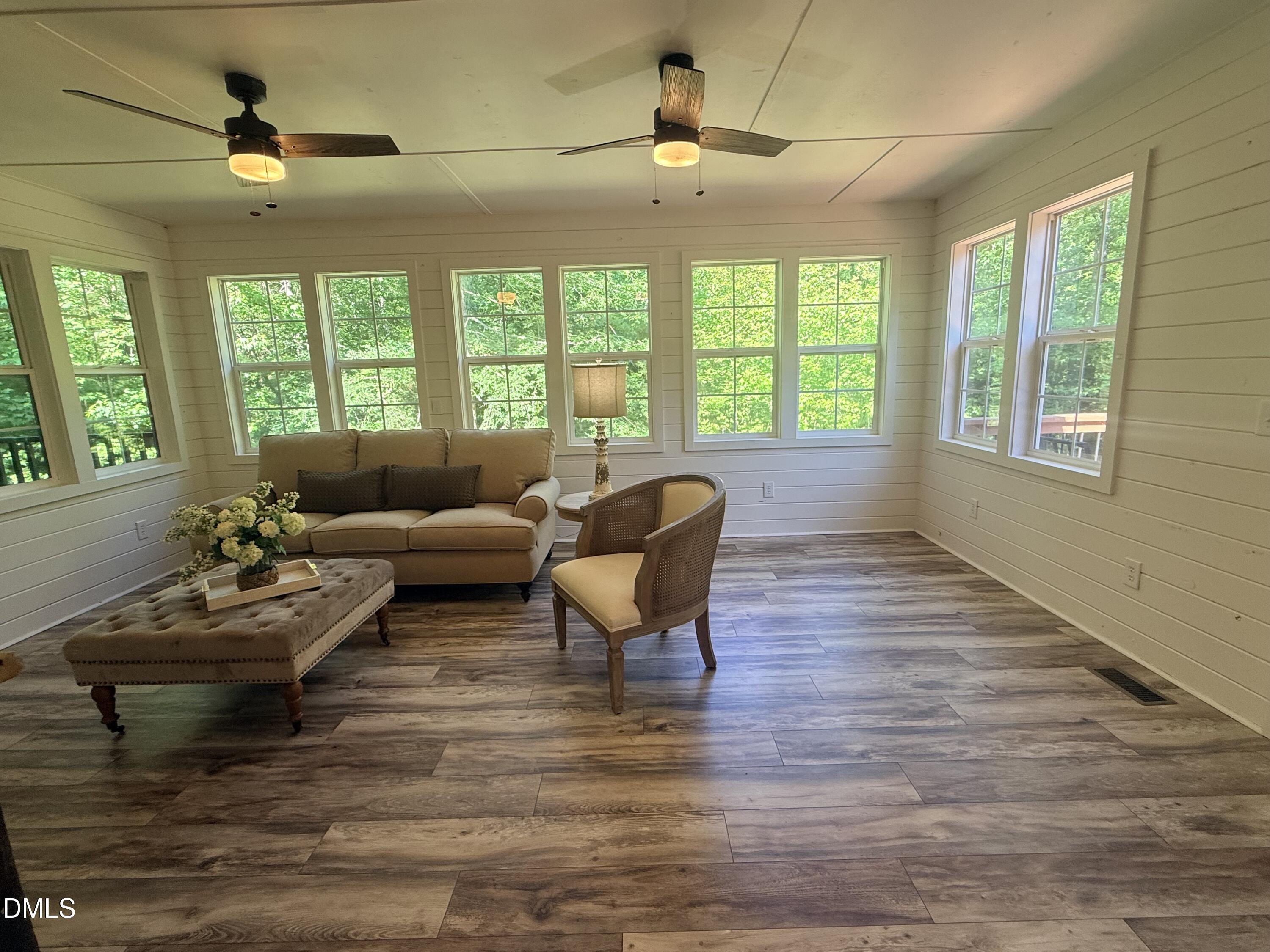 327 Shady Oak Road Roxboro, NC 27574 - Photo 17 of 62 a living room with furniture and a large window