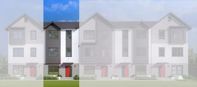 a front view of a residential apartment building with a yard