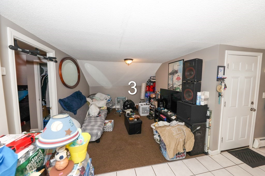 459 Snell Street Fall River, MA 02721 - Photo 29 of 42 a very nice looking room with many windows