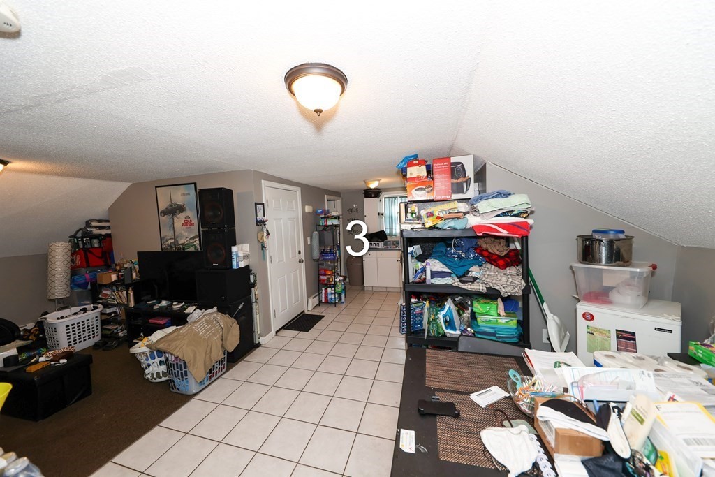 459 Snell Street Fall River, MA 02721 - Photo 31 of 42 a storage room with furniture