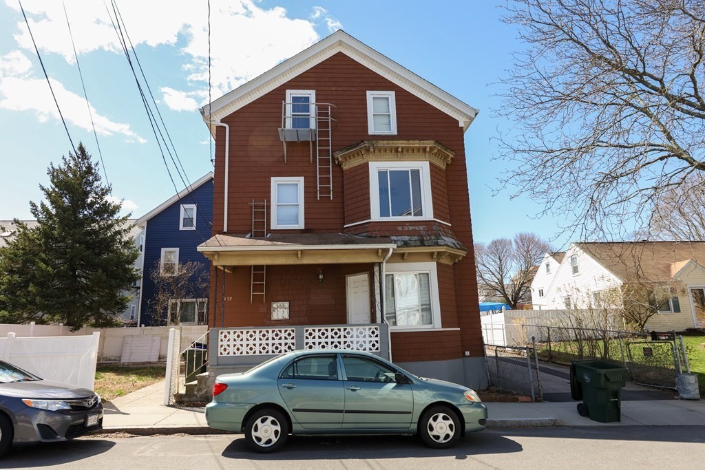 459 Snell Street Fall River, MA 02721 - Photo 38 of 42 a car parked in front of a house